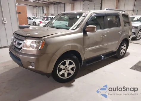 2009 Honda Pilot Touring z USA, uszkodzony, nr VIN 5FNYF48859B025333